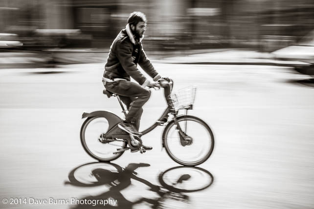 Blurred Bicyclist on the Boulevard